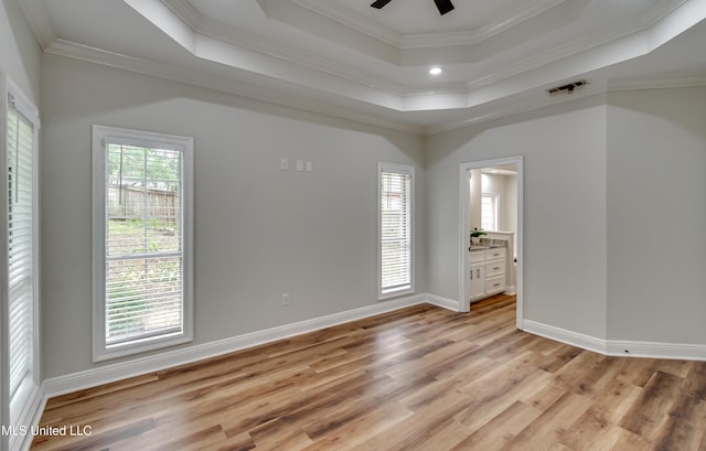 105 Lilac Ct, Madison, MS 39110 - empty room featuring light wood-style flooring, a raised ceiling, ceiling fan, and crown molding