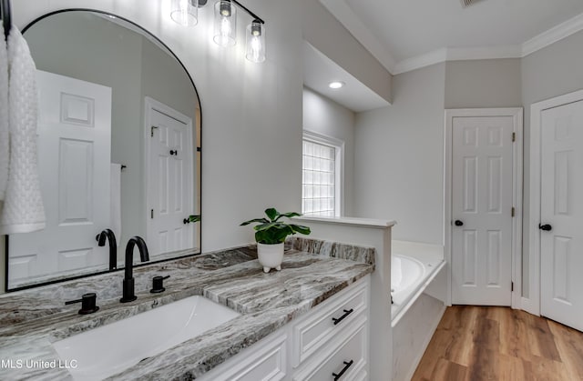 105 Lilac Ct, Madison, MS 39110 - full bathroom featuring ornamental molding, a bath, wood finished floors, and vanity