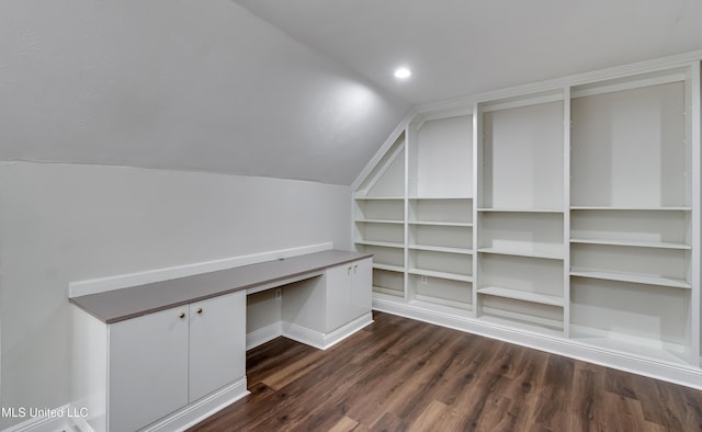105 Lilac Ct, Madison, MS 39110 - walk in closet with dark wood-style floors, vaulted ceiling, and built in study area