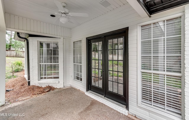 105 Lilac Ct, Madison, MS 39110 - view of exterior entry with french doors, a ceiling fan, and a patio