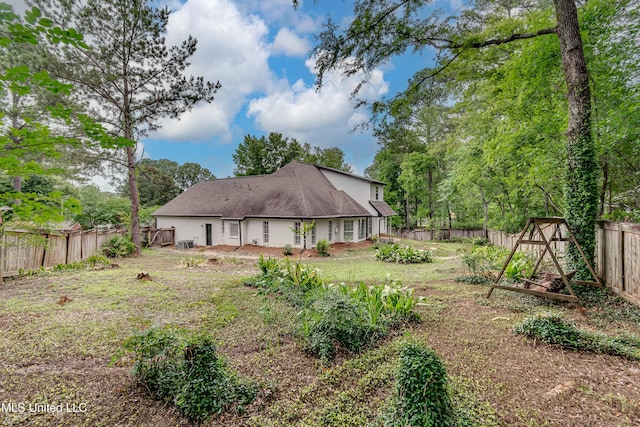105 Lilac Ct, Madison, MS 39110 - rear view of house with a fenced backyard
