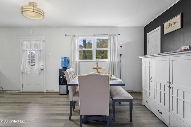 dining space featuring light wood-type flooring