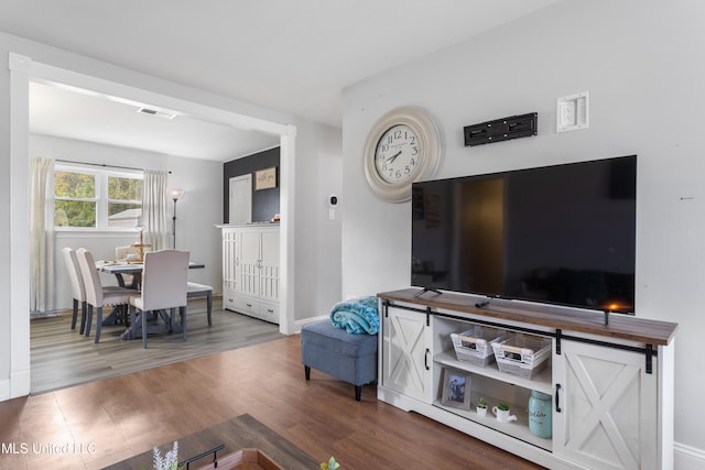 living room with hardwood / wood-style floors