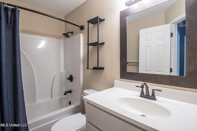 full bathroom with vanity, toilet, and shower / tub combo