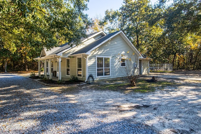 view of front of home featuring covered porch