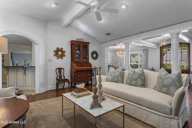 living room featuring ceiling fan with notable chandelier, ornate columns, lofted ceiling with beams, and dark hardwood / wood-style floors