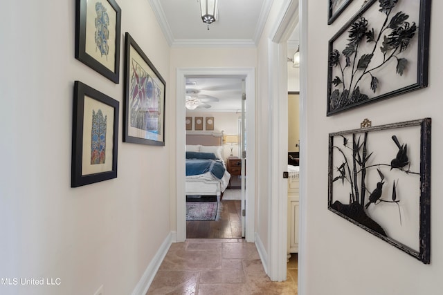 hall with ornamental molding and hardwood / wood-style flooring