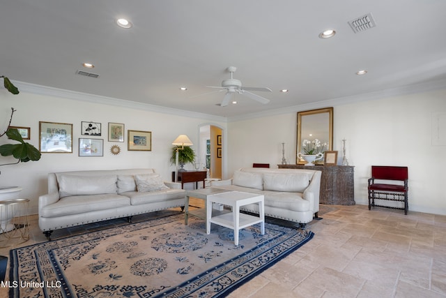 living room featuring ceiling fan and crown molding