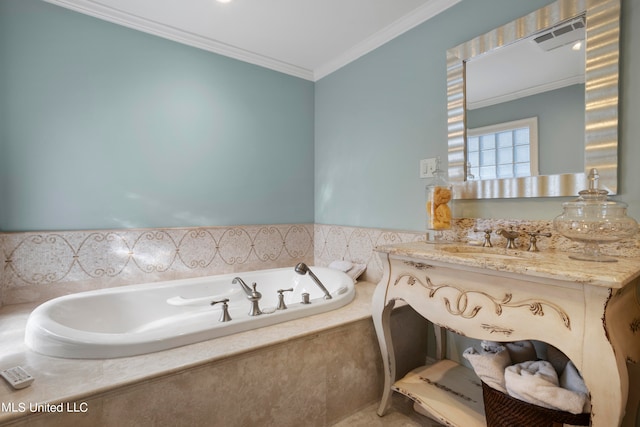 bathroom with vanity, tiled bath, and crown molding