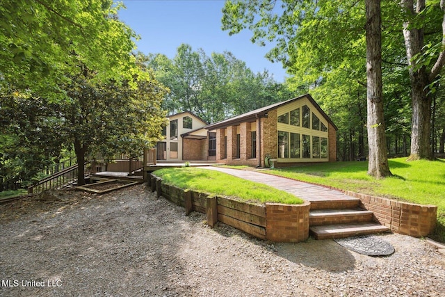 6821 Autumn Oaks Dr, Olive Branch, MS 38654 - rear view of property featuring a yard
