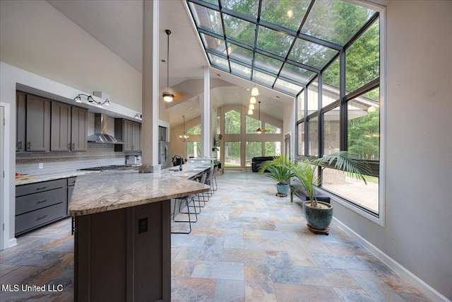 6821 Autumn Oaks Dr, Olive Branch, MS 38654 - view of patio with glass enclosure and an outdoor kitchen