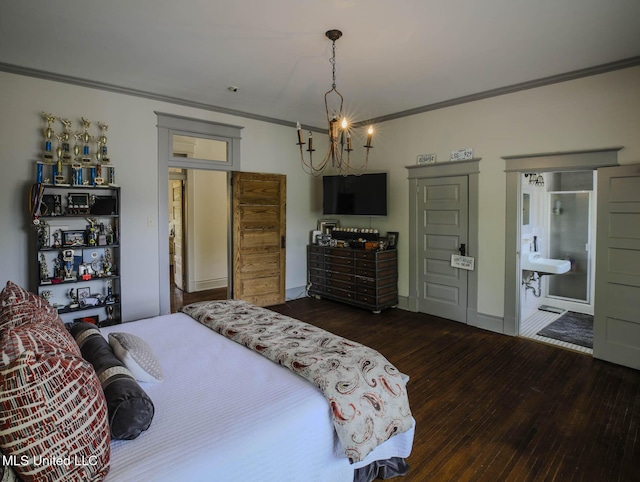 307 Grand Blvd, Greenwood, MS 38930 - bedroom featuring crown molding, a chandelier, and dark wood-style floors