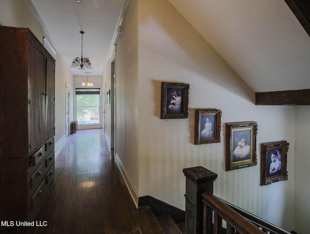 307 Grand Blvd, Greenwood, MS 38930 - corridor featuring baseboards, an inviting chandelier, and dark wood finished floors