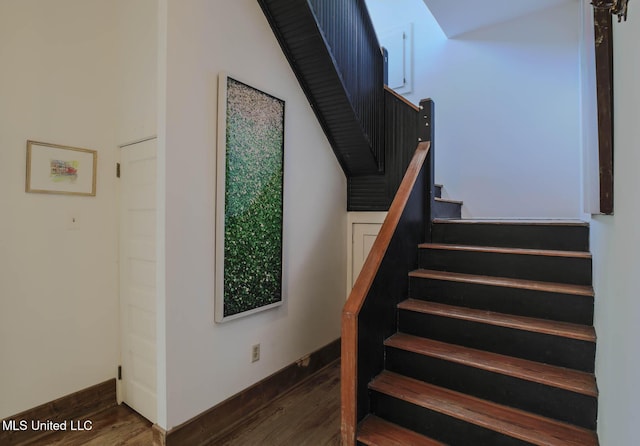 307 Grand Blvd, Greenwood, MS 38930 - staircase with baseboards and wood finished floors