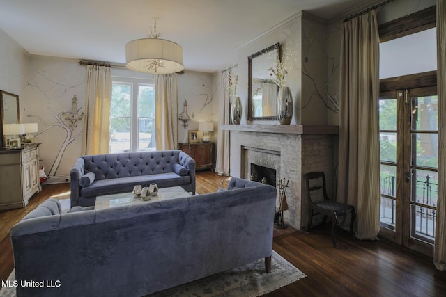307 Grand Blvd, Greenwood, MS 38930 - living area featuring wood finished floors and a fireplace