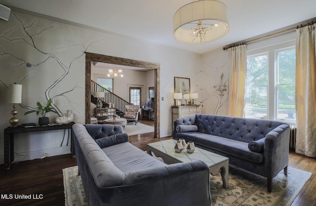 307 Grand Blvd, Greenwood, MS 38930 - living area with an inviting chandelier, stairs, and wood finished floors