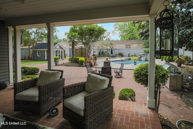 307 Grand Blvd, Greenwood, MS 38930 - view of patio with a fenced in pool and a fenced backyard