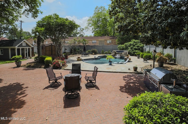 307 Grand Blvd, Greenwood, MS 38930 - view of pool with a hot tub, a patio, and a fenced backyard