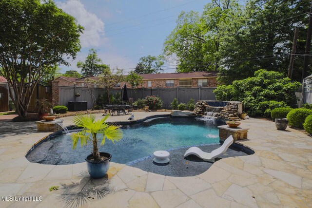 307 Grand Blvd, Greenwood, MS 38930 - view of swimming pool with a patio, a fenced backyard, and a fenced in pool