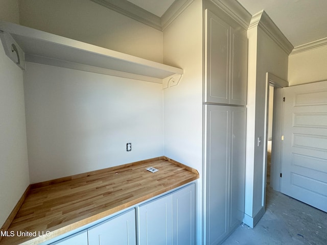 interior space featuring crown molding