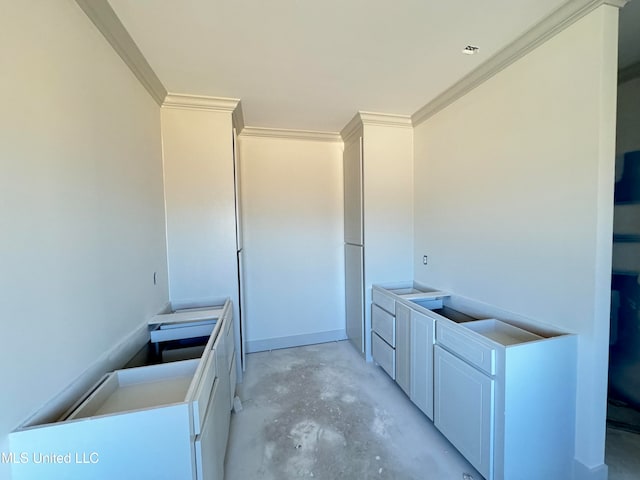 laundry room with ornamental molding