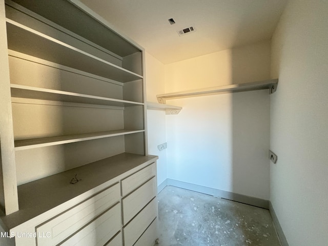 spacious closet with visible vents