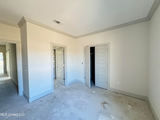 unfurnished bedroom featuring unfinished concrete floors, a closet, visible vents, and baseboards