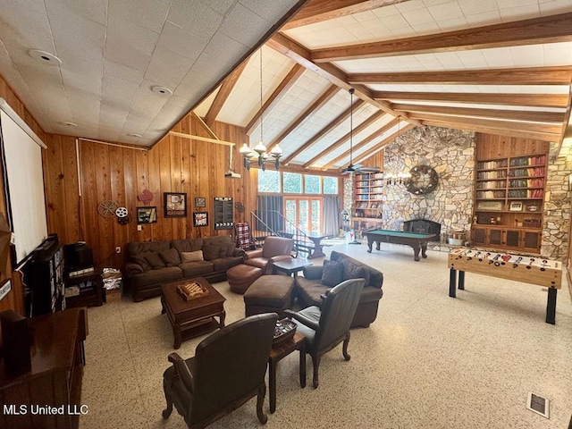 living area featuring visible vents, vaulted ceiling with beams, wood walls, and billiards