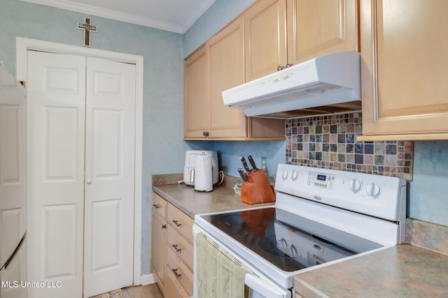 kitchen with light brown cabinetry, white range with electric cooktop, tasteful backsplash, under cabinet range hood, and ornamental molding