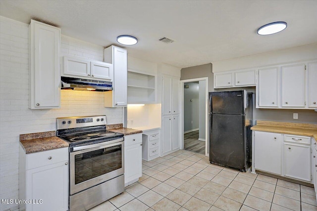 kitchen featuring under cabinet range hood, stainless steel electric range, freestanding refrigerator, white cabinets, and open shelves