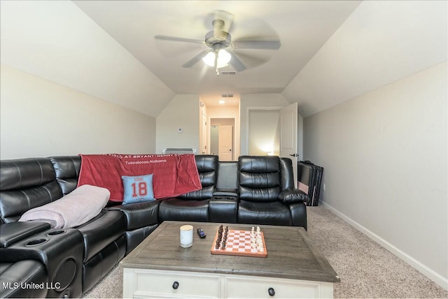 carpeted living room featuring lofted ceiling and ceiling fan