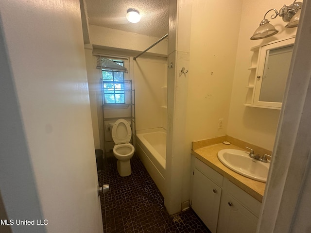 full bathroom featuring toilet, shower / bath combination, tile patterned flooring, vanity, and a textured ceiling