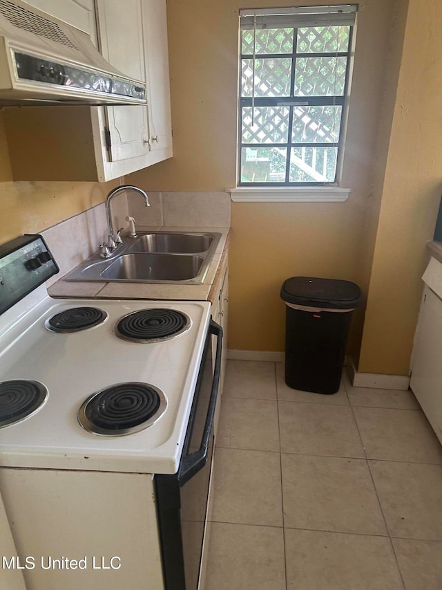 kitchen with white electric range, ventilation hood, sink, and light tile patterned floors