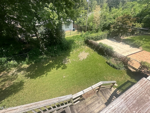 view of yard with a wooden deck