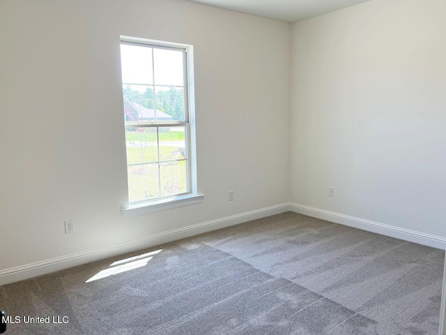12111 Walker Rd, Ocean Springs, MS 39564 - carpeted spare room with baseboards