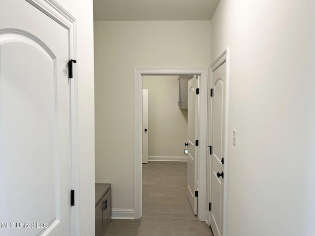 12111 Walker Rd, Ocean Springs, MS 39564 - hall with light wood-type flooring and baseboards