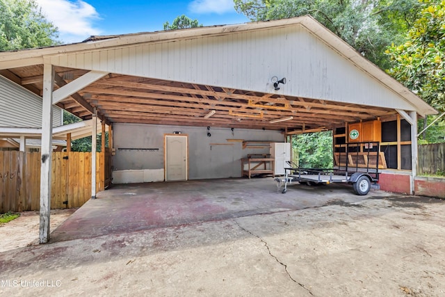5423 Kaiki Dr, Diamondhead, MS 39525 - garage with a detached carport