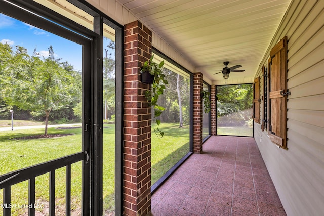 5423 Kaiki Dr, Diamondhead, MS 39525 - unfurnished sunroom featuring ceiling fan