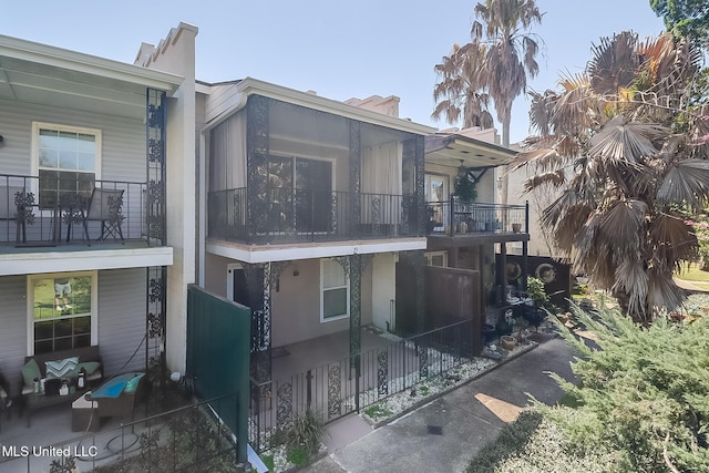 view of side of property featuring stucco siding