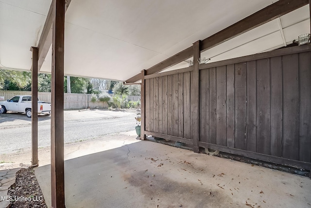 view of patio featuring fence