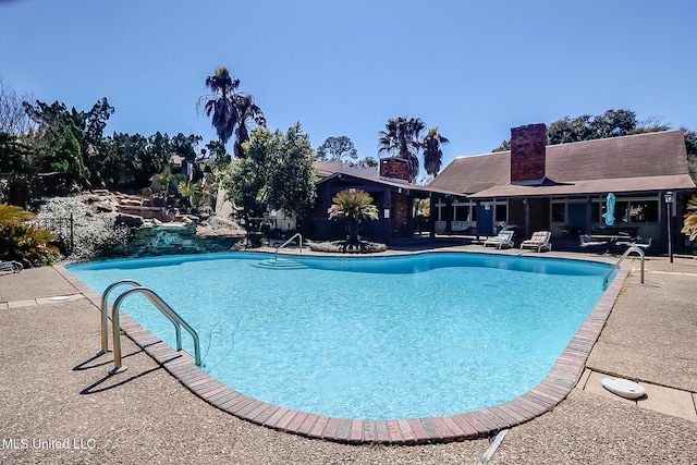 pool with a patio