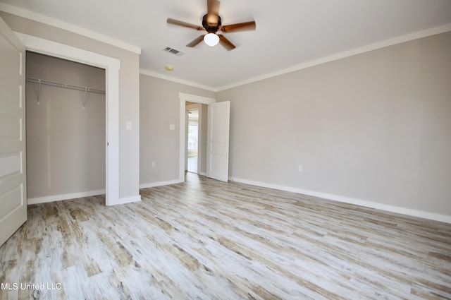 2200 19th Ave, Gulfport, MS 39501 - unfurnished bedroom featuring crown molding, wood finished floors, a closet, baseboards, and a ceiling fan