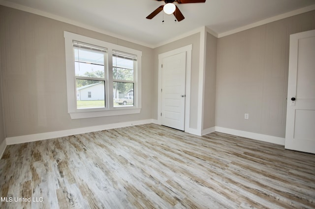 2200 19th Ave, Gulfport, MS 39501 - unfurnished bedroom featuring ornamental molding, wood finished floors, baseboards, and ceiling fan