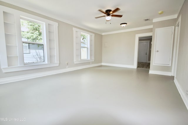 2200 19th Ave, Gulfport, MS 39501 - empty room with crown molding, baseboards, finished concrete floors, ceiling fan, and a smoke detector