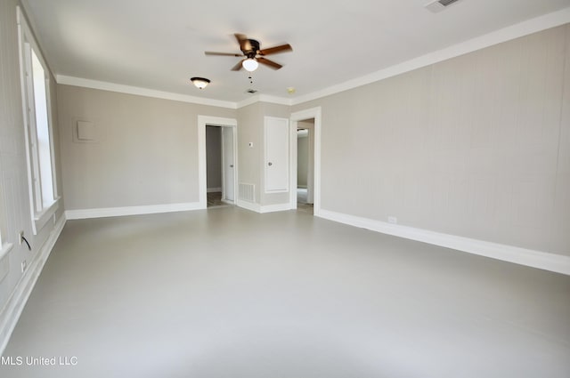 2200 19th Ave, Gulfport, MS 39501 - empty room featuring concrete flooring, a ceiling fan, ornamental molding, baseboards, and healthy amount of natural light