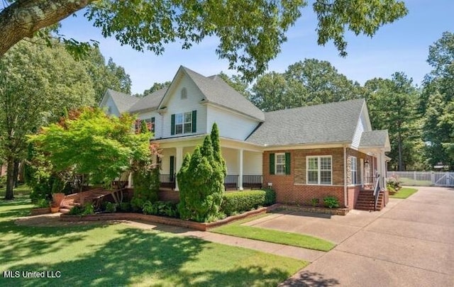 4424 Rebekah Dr, Olive Branch, MS 38654 - view of front facade featuring a porch and brick siding