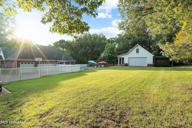 4424 Rebekah Dr, Olive Branch, MS 38654 - view of yard featuring an outdoor structure and a garage