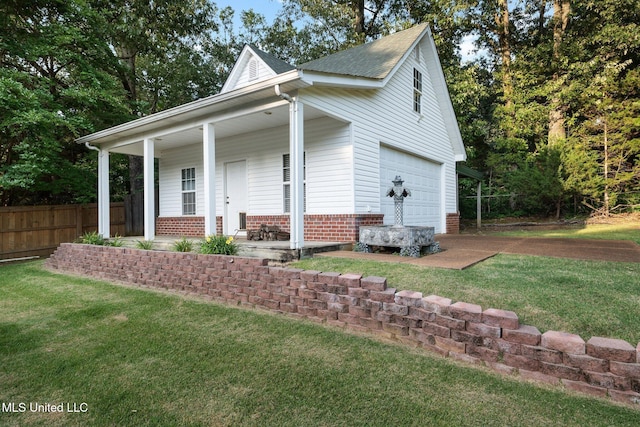 4424 Rebekah Dr, Olive Branch, MS 38654 - view of front facade with a porch, brick siding, and a garage