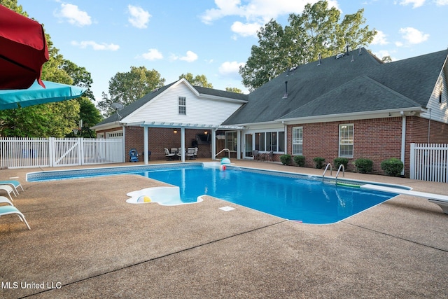 4424 Rebekah Dr, Olive Branch, MS 38654 - view of pool with a patio area, a fenced backyard, a pergola, and a diving board