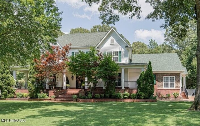 4424 Rebekah Dr, Olive Branch, MS 38654 - view of front of home featuring a front yard, covered porch, and brick siding
